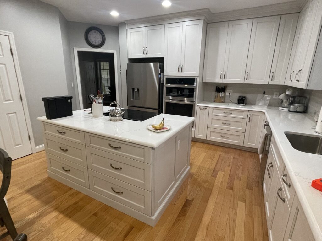 Kitchen remodel in Gainesville VA with white cabinetry and large island