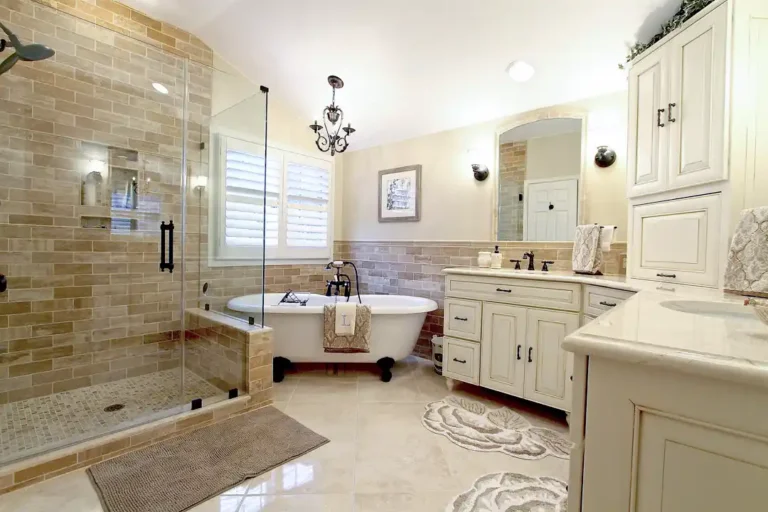 Gainesville VA primary bathroom remodel with tile shower, freestanding tub, double vanity, and custom cabinetry