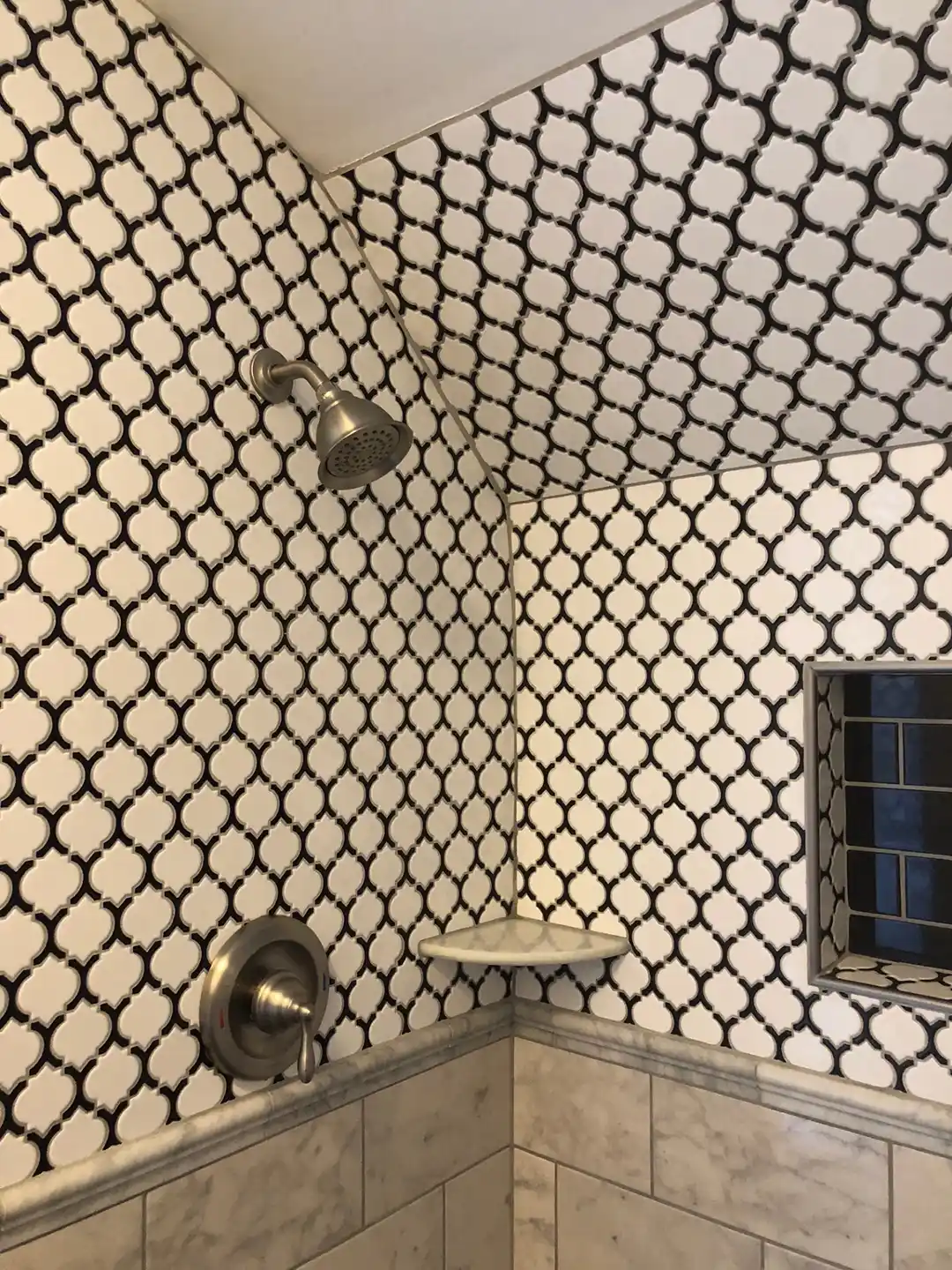 manassas-va-primary-bathroom-remodel-patterned-shower-corner-shelf